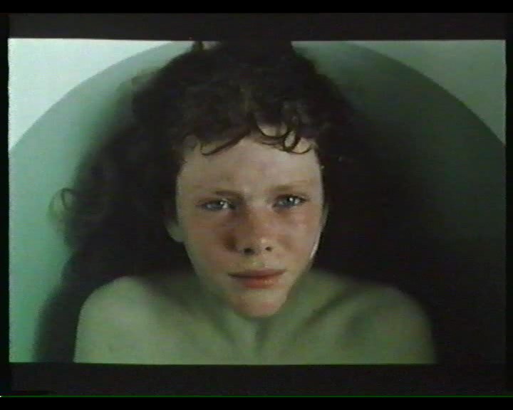 0. Line Storesund (12 years old) lies in a bathtub. 